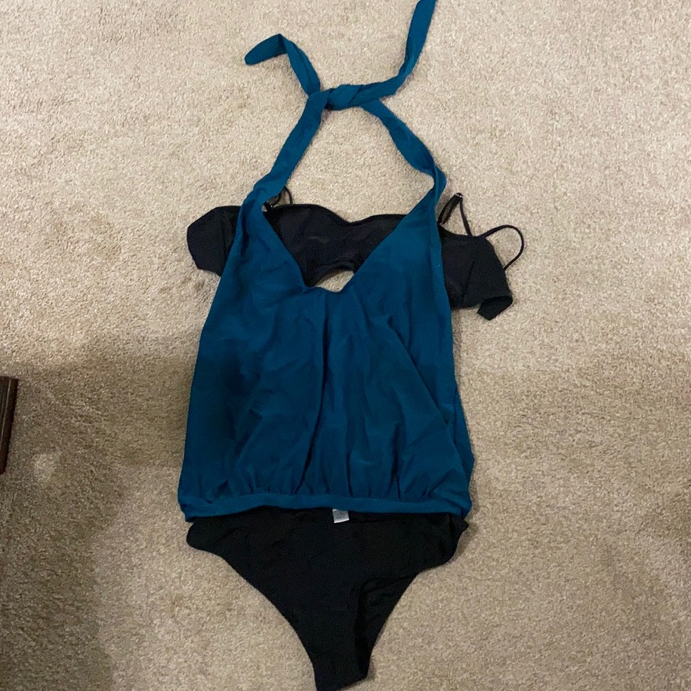 New in packaging 3 piece swim suit, black and teal